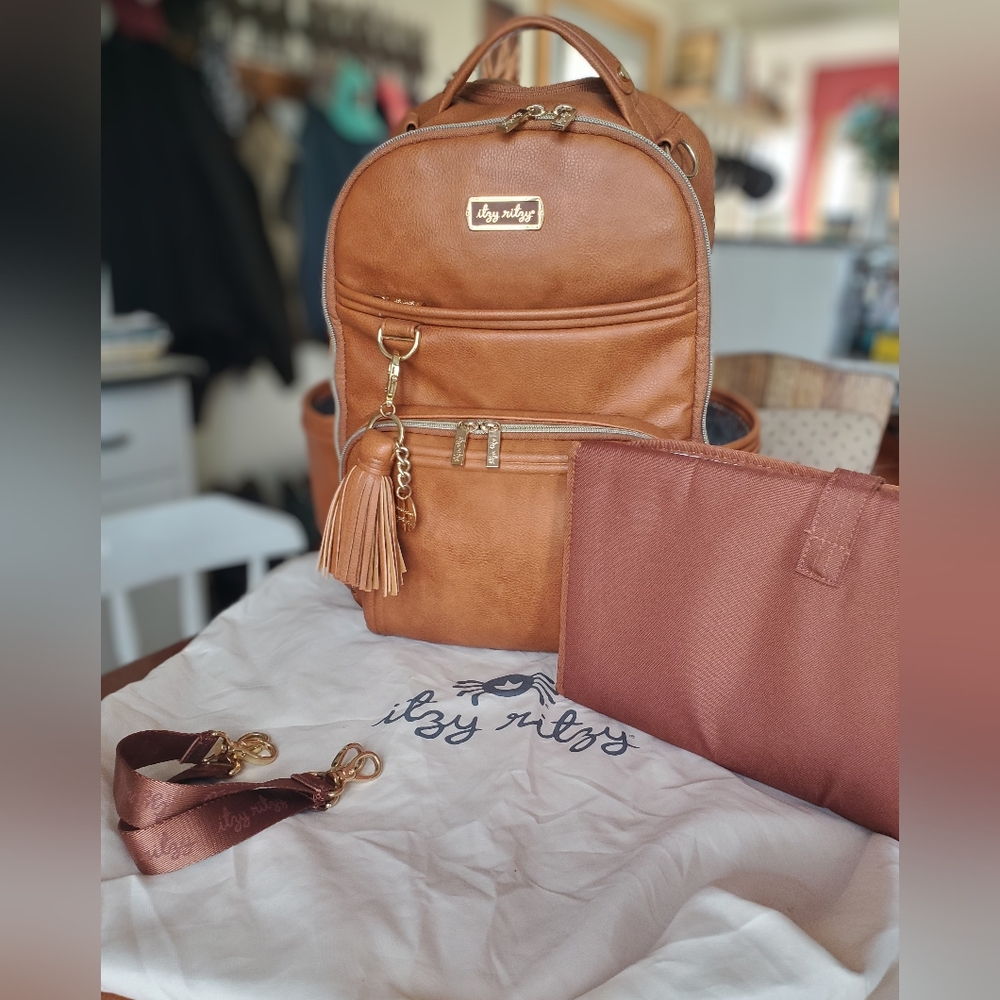 Itzy Ritzy Boss Plus